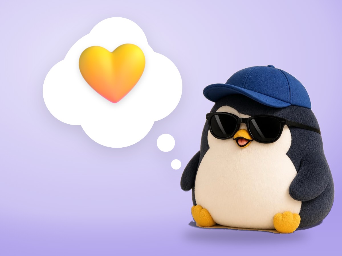 A corduroy plush penguin picking up a single French fry next to a paper cup of fries