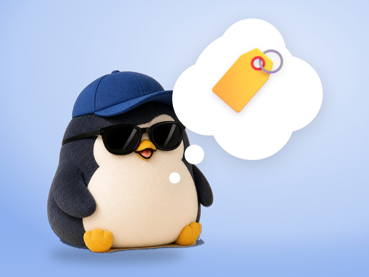A low-poly wood and paper penguin smiling brightly into a small round hand mirror