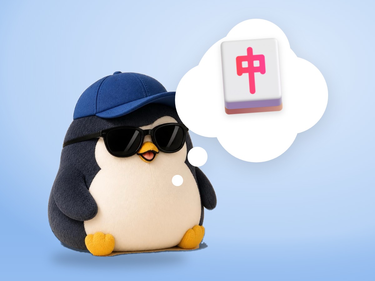 A hand-embroidered felt penguin holding one realistic Japanese calligraphy brush with a soft smile