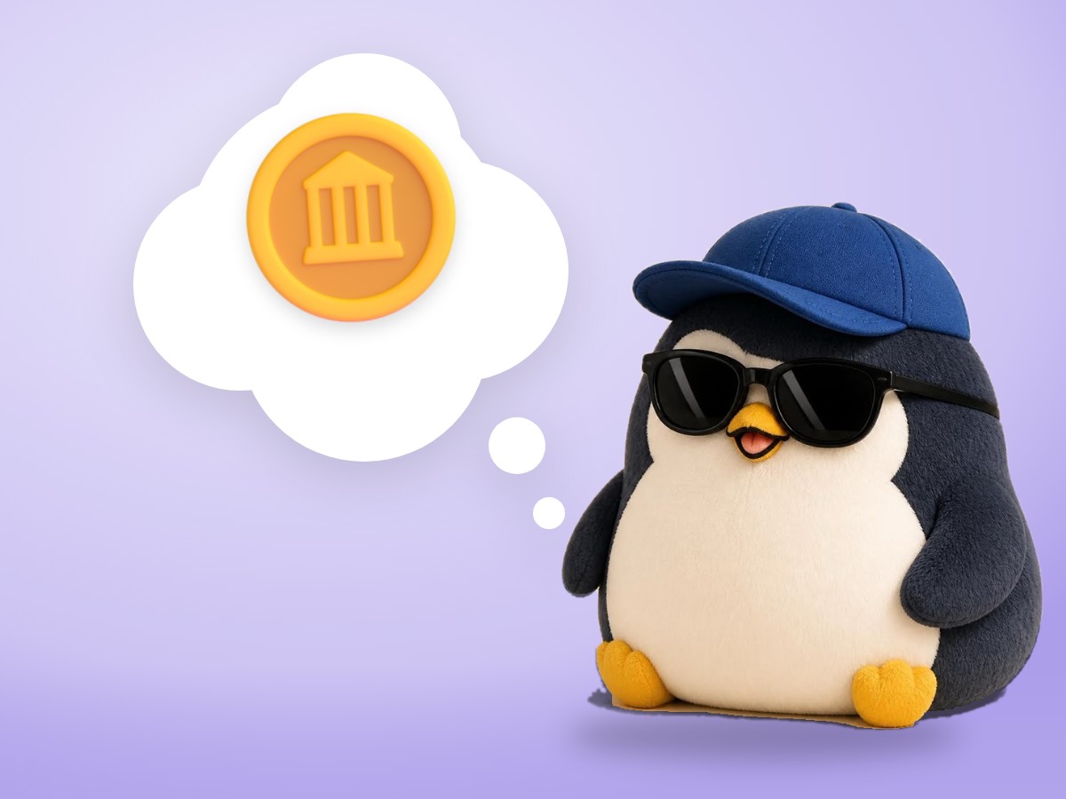 A soft felted wool penguin holding up one shiny gold coin with both flippers, smiling