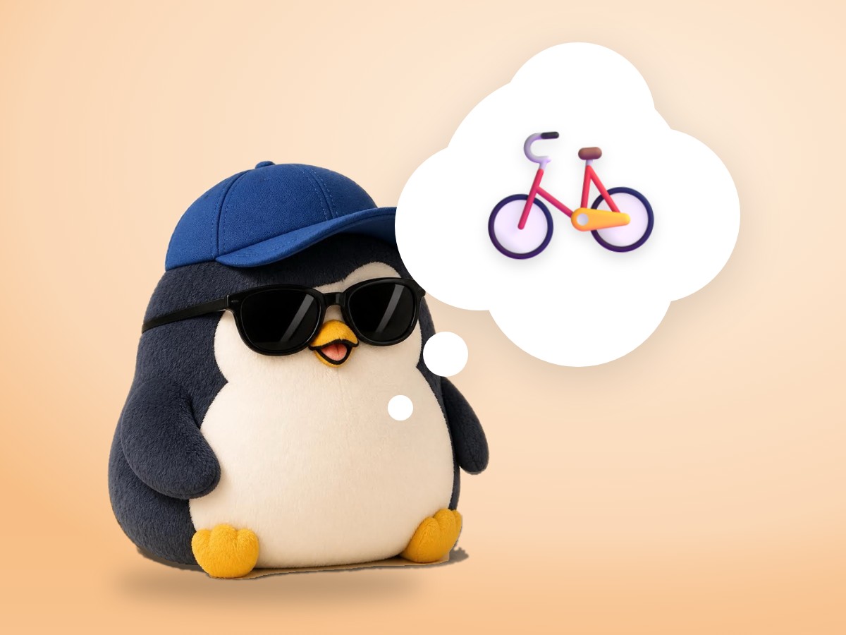 A model-kit penguin bowing politely next to a bright city rental bicycle