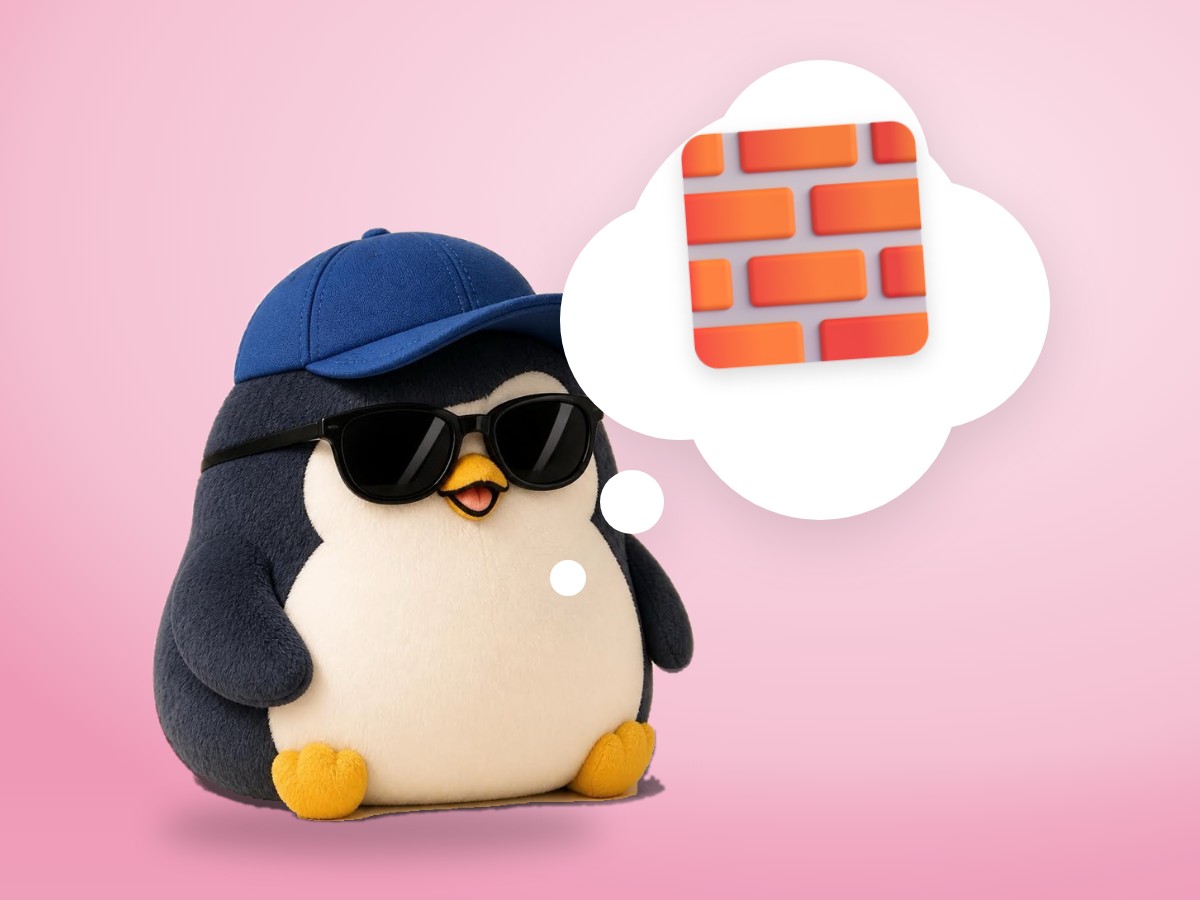 A chenille yarn penguin peeking over a low wall made of three large realistic wooden toy blocks