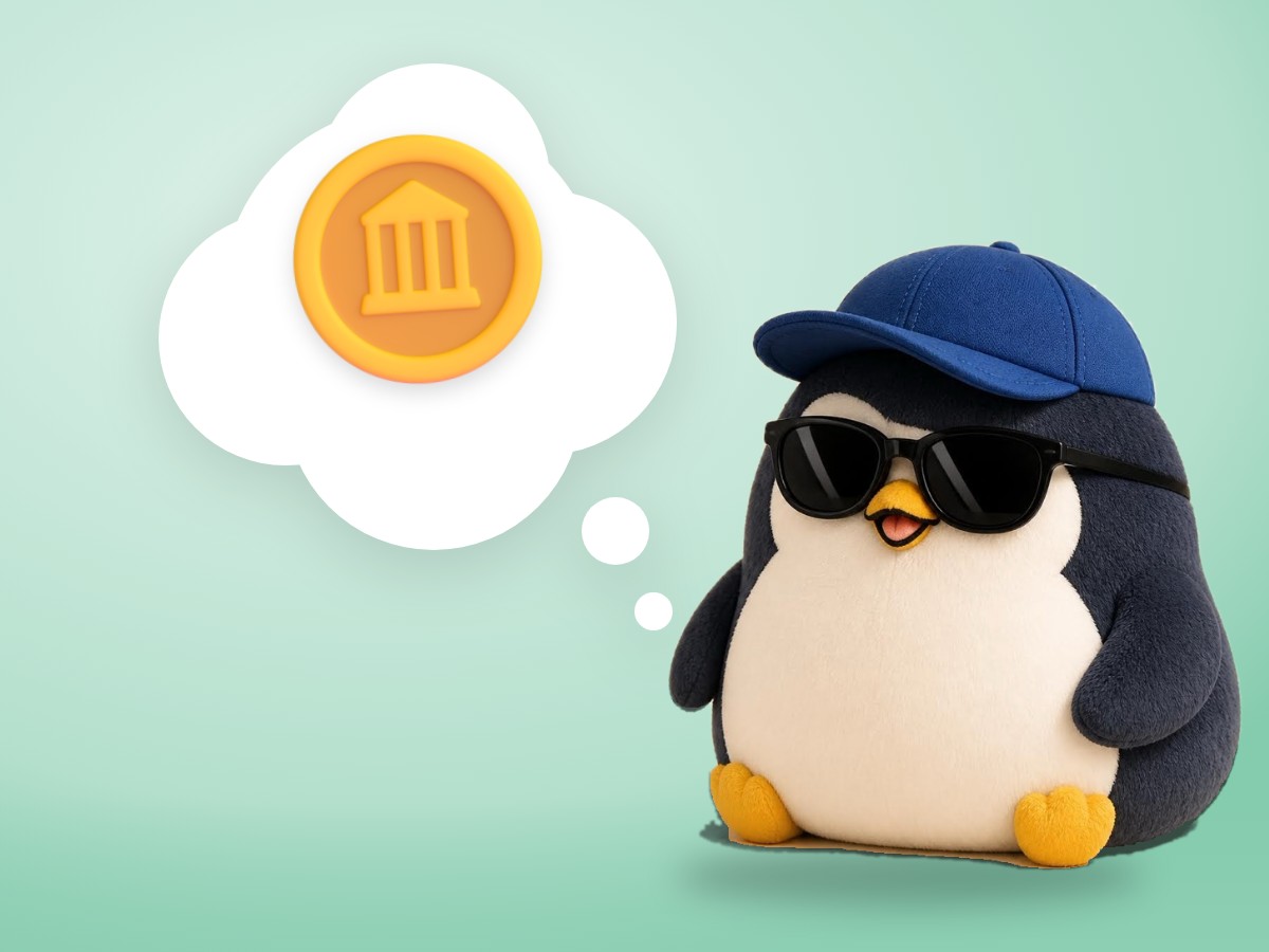 A chubby felted wool penguin holding a small brass coin bank, smiling on a sunny pastel table