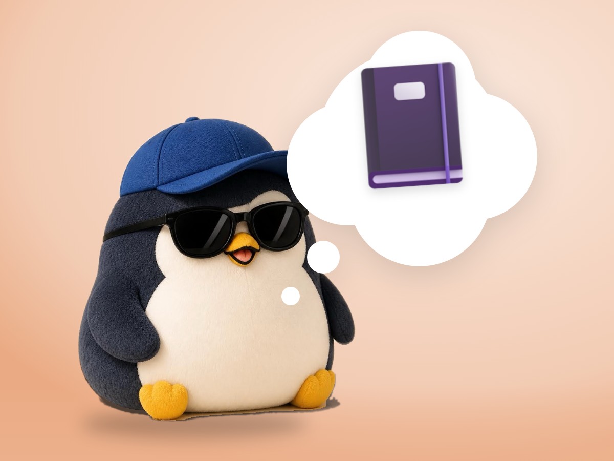 A chubby crocheted amigurumi penguin writing in a realistic open notebook with a pen in soft morning light