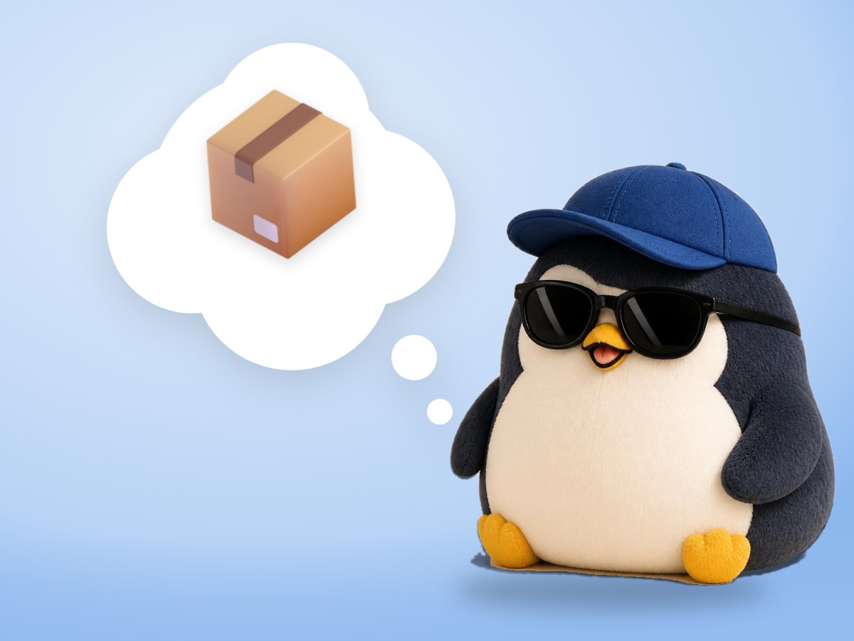 A layered cut paper penguin happily carrying one small cardboard box out of a bright, airy space