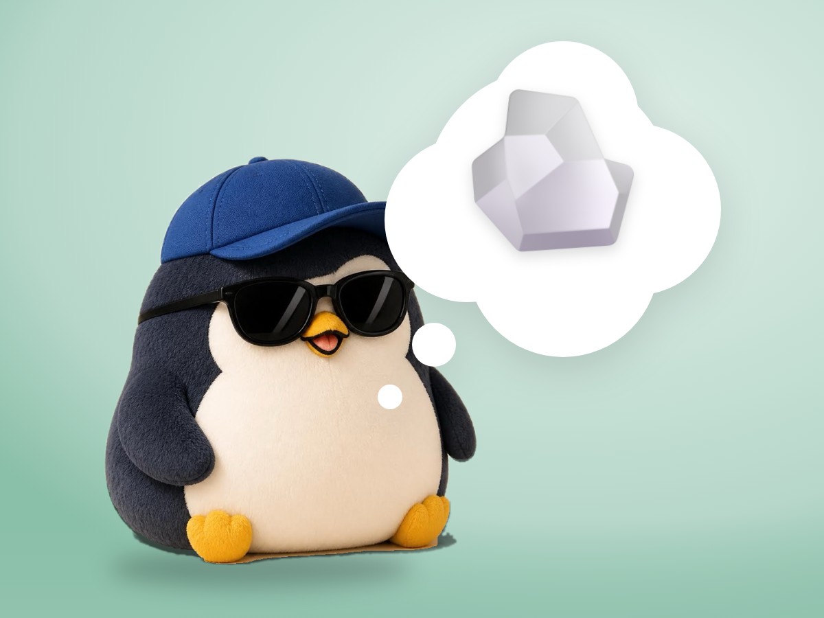 A chubby matte plastic model kit penguin holding one big smooth stone over a real terracotta clay pot that already has three stones in it