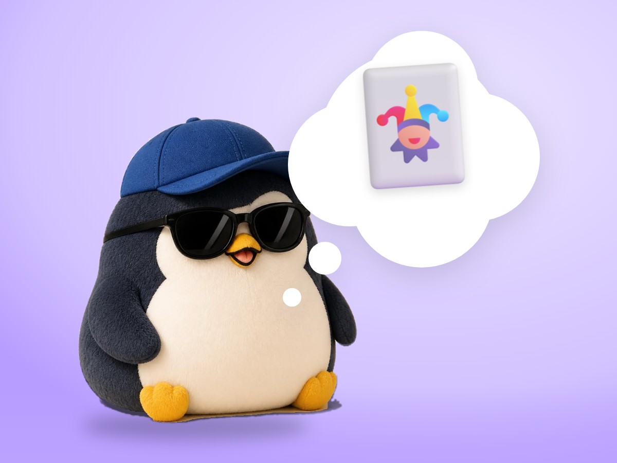 A chenille yarn penguin proudly holding up one shiny trading card